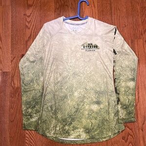 A women’s, like new, UPF shirt